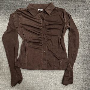 synching brown button up